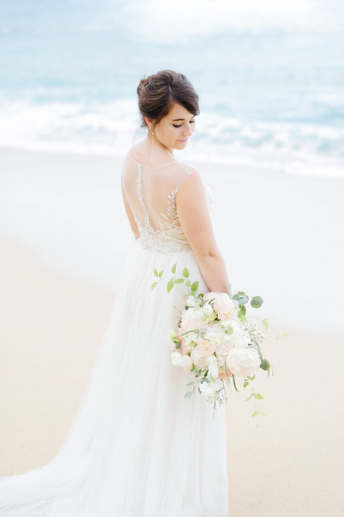 white bridal bouquet on the beach in Hawaii