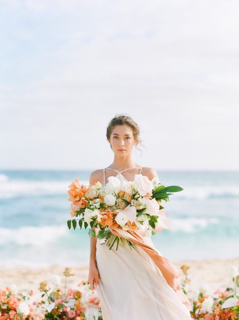 Tropical flower bridal bouquet for a hawaii beach wedding ceremony