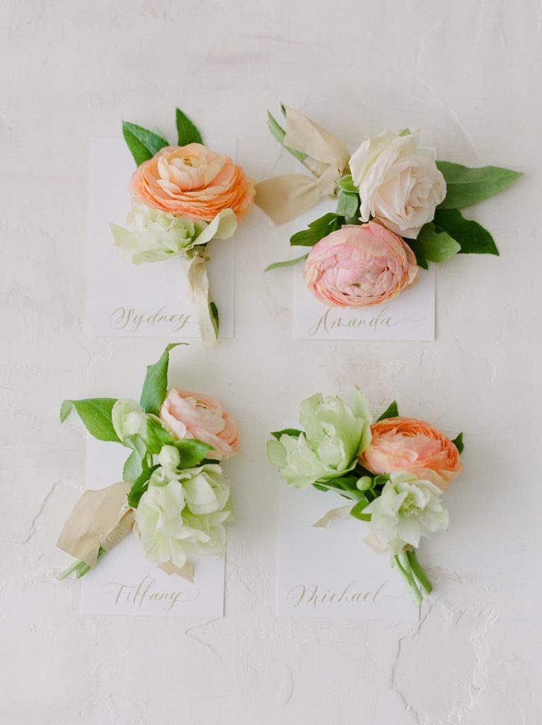 Ranunculus boutonnieres made in Hawaii by florist designs by hemingway
